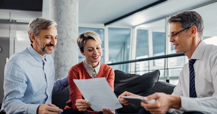 Family discussing life insurance plan with insurance advisor